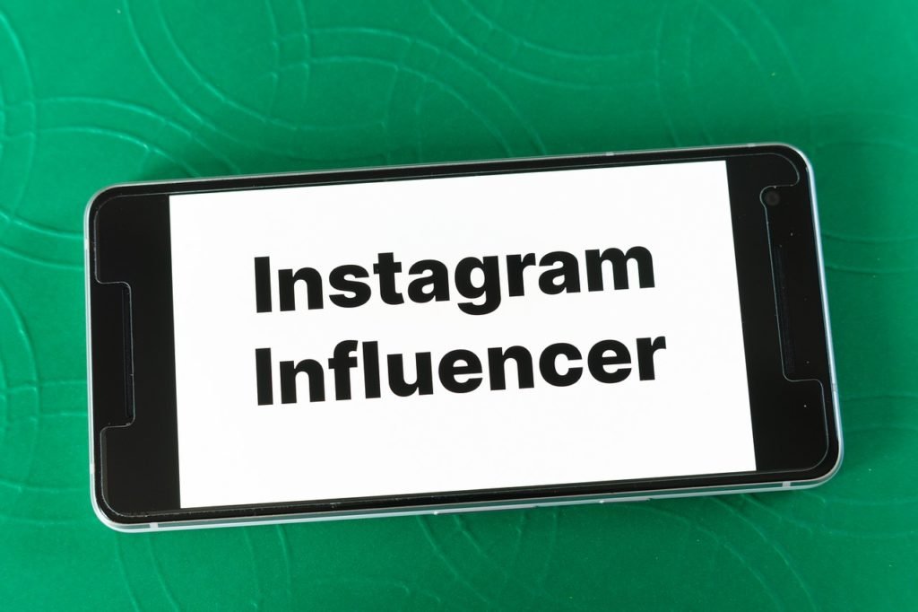 smartphone with the words Instagram Influencer